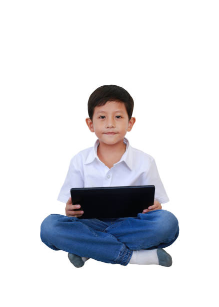 Asian little girl using smart device