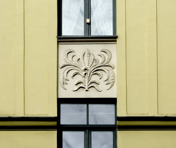 istock floral detail engraved on green building 2178364532