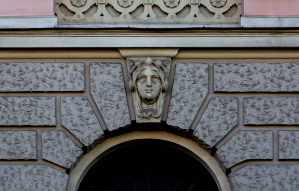 istock female face with laurel wreath 2178365311