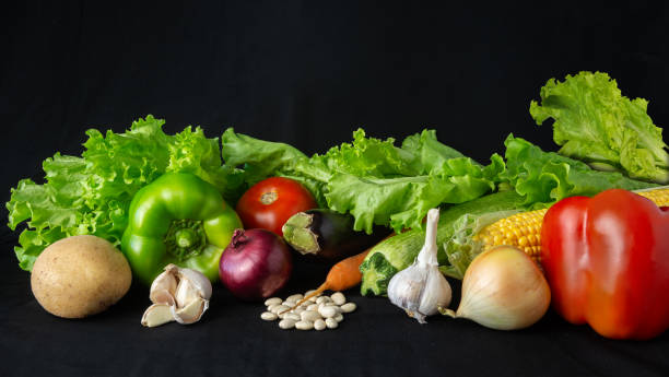 istock Fresh organic vegetables on a black fabric background 2178366526