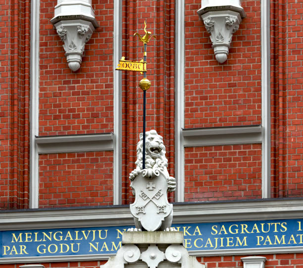 lion on shield and arms with spear with golden motifs