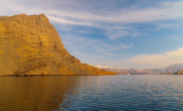 istock Beautiful Mountain by Tranquil Sea Under Blue Sky 2178367097