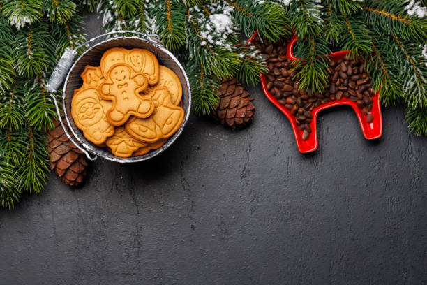 istock Christmas background with fir tree, gingerbread cookies, nuts, and copy space for greetings 2178367377