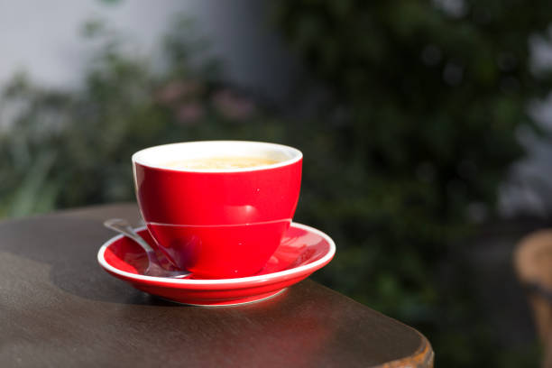 Paris, France: Empty Red Espresso Cups, Sunlit Orange Cafe Table