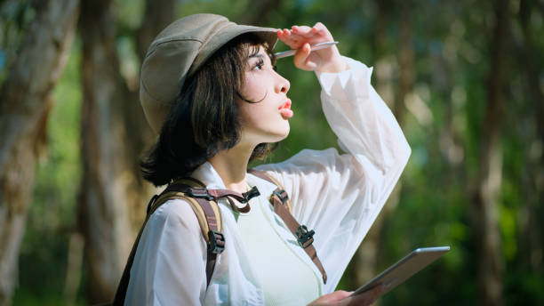 Young asian woman enjoying view in nature.