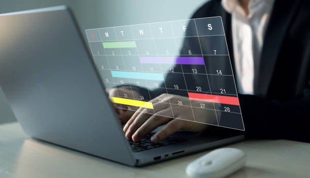 istock Businessman manages time to work efficiently and on time on all projects. Calendar work schedule, business plan concept.Managing a scheduled meeting. 2178372653