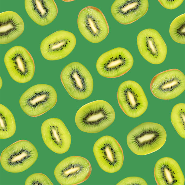 istock Kiwi seamless pattern for design. Juicy fresh fruit slices. Summer print wallpaper. Green background.Top view. Flat lay 2178374491