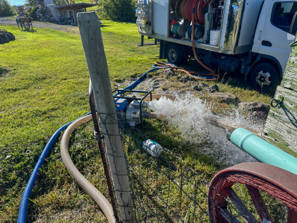 istock Water Pumping Operation with Industrial Equipment in Rural Area 2178383737