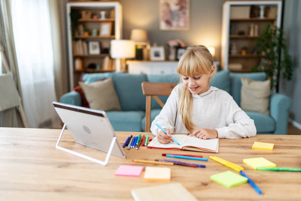 istock Young Caucasian girl learning at home 2178383828