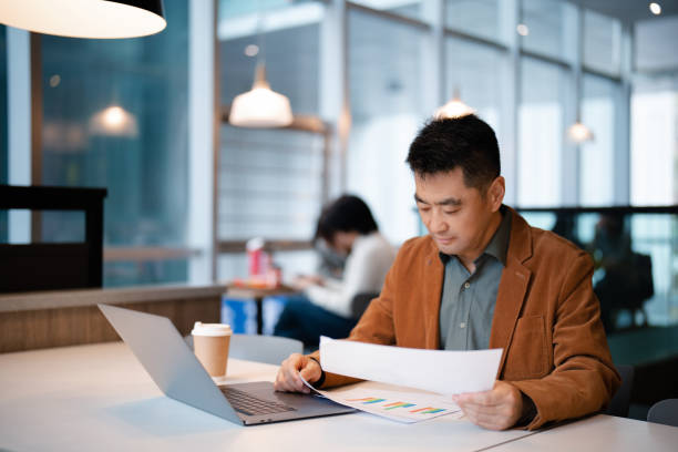 istock Mature middle-aged man working in the office 2178384073