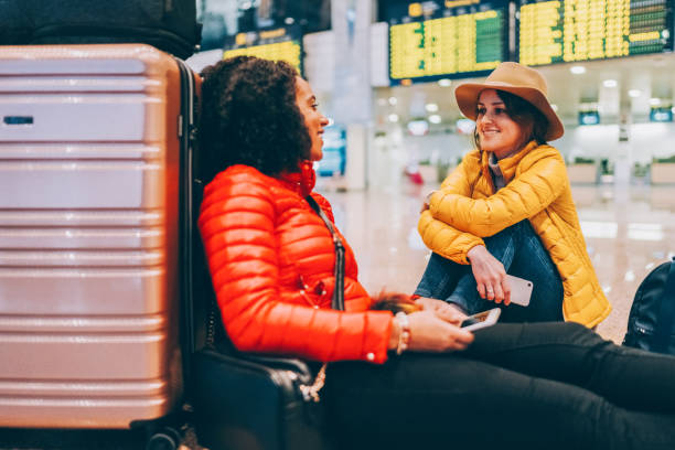 istock Friends at the airport 2178385612