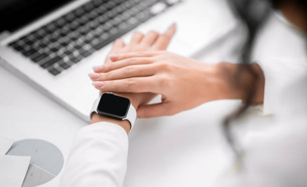 istock Unrecognizable girl looking at her wrist watch 2178386125