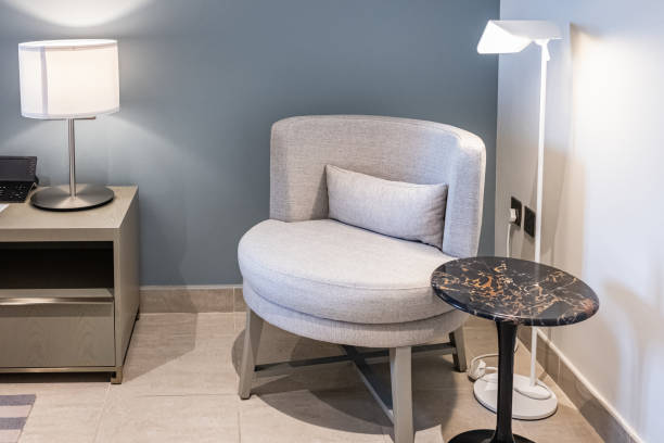 istock Interior with grey wall beige armchair and marble side table 2178387469