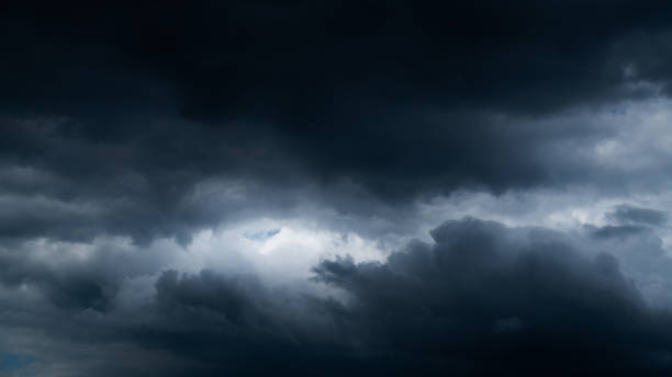istock Sky full of dark stormy clouds 2178390696