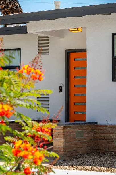 Palm Springs, CA, US-May 22, 2024: Exterior of mid-century modern luxury house in suburban neighborhood.