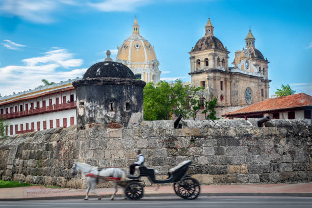istock ancient city wall and horse-drawn cart 2178391262