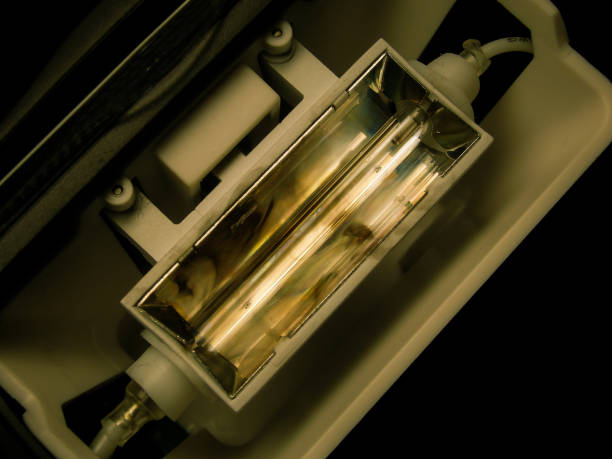 A glass tube with red and blue light from the gas.