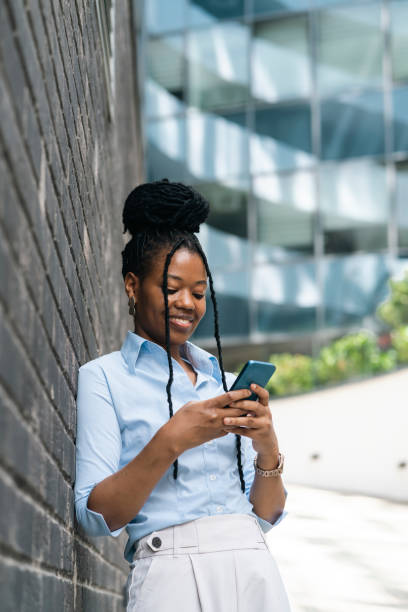 istock Young business woman using phone 2178391431
