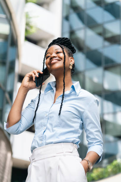 istock Young business woman using phone 2178391659