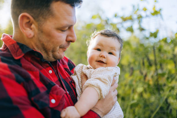 istock Father Embracing His Cute Baby at Alaskan Home 2178392638