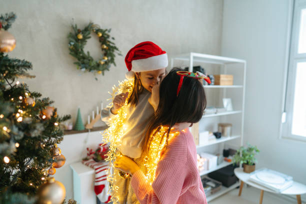 istock Mommy and me under the Christmas lights 2178395955