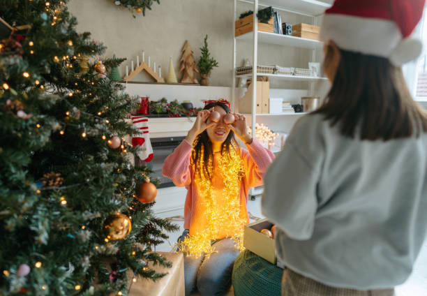 istock Mother and daughter having fun on Christmas Day 2178396024