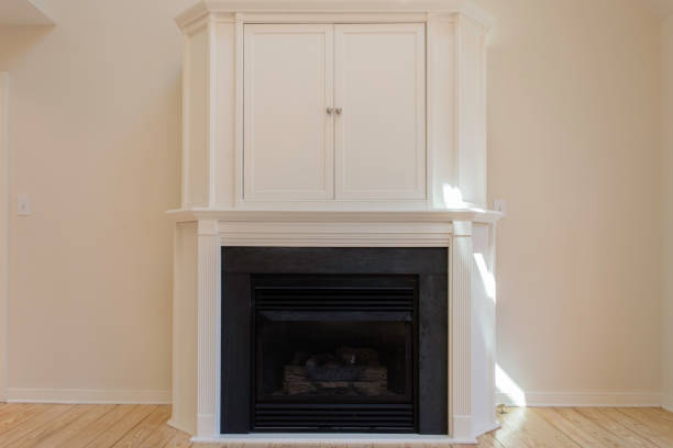 istock White Fireplace With Enclosed Cabinet Above The Mantel 2178399695