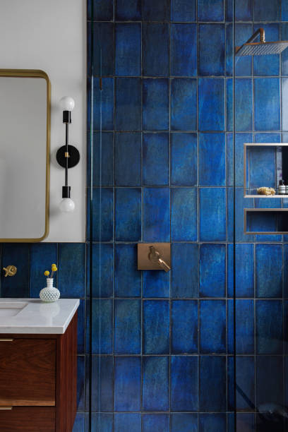 istock Contemporary Bathroom With Blue Tile Shower Wall 2178399745