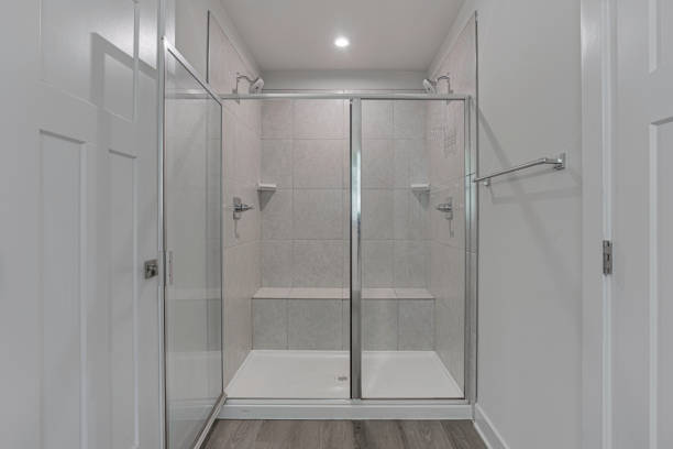 istock Spacious Bathroom With Glass Double Shower Area 2178399883
