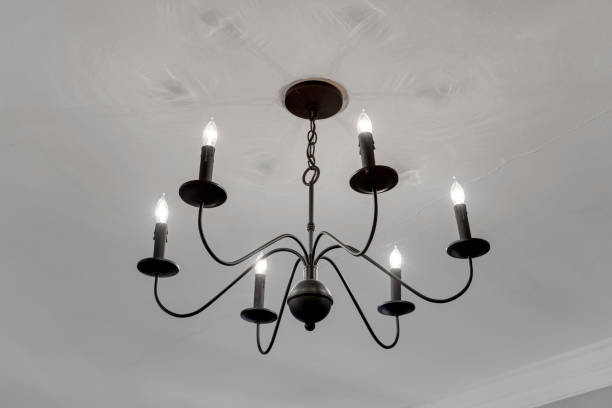 istock Modern Chandelier In Spacious Room With Soft Lighting. 2178400796