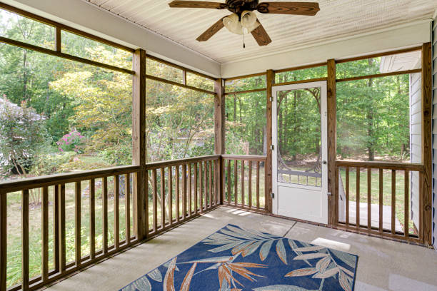 istock Cozy Screened Porch With Ceiling Fan And Forest View 2178400885