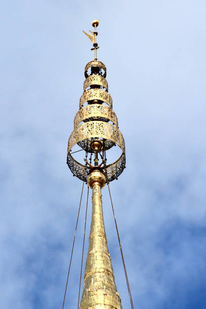Golden chedi atop the Doi Suthep stupa shines in bright sunlight, Northern Thailand