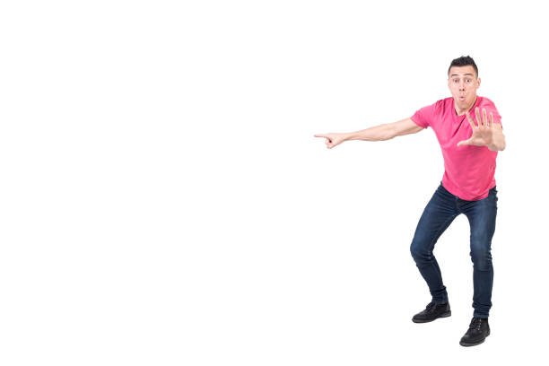 istock Astonished man pointing aside with hand. White background 2178402242
