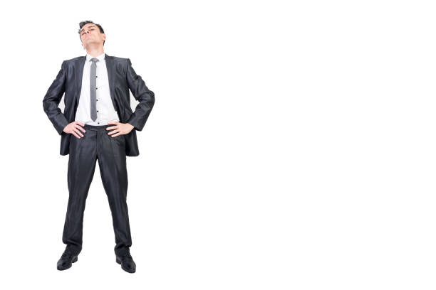 istock Self confident man in elegant suit. White background. 2178403416