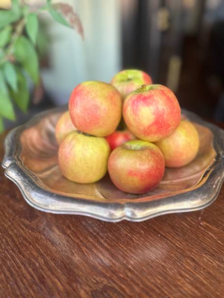 istock Yummy fresh apples in beautiful dish 2178405104