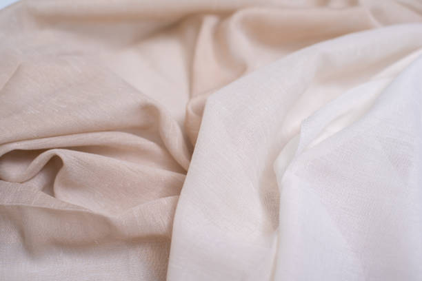 istock Samples of milk and gray fabric for tulle. Light and transparent fabric for curtains. 2178405671