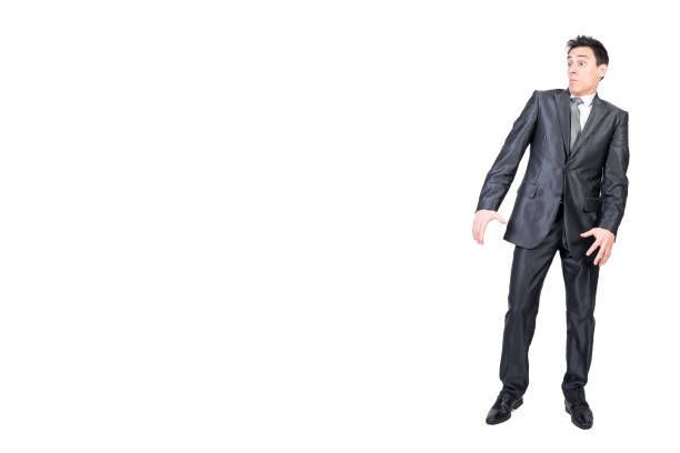 istock Astonished young businessman looking away in white studio 2178406593