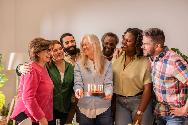 istock Group of diverse people celebrating birthday at home 2178406677
