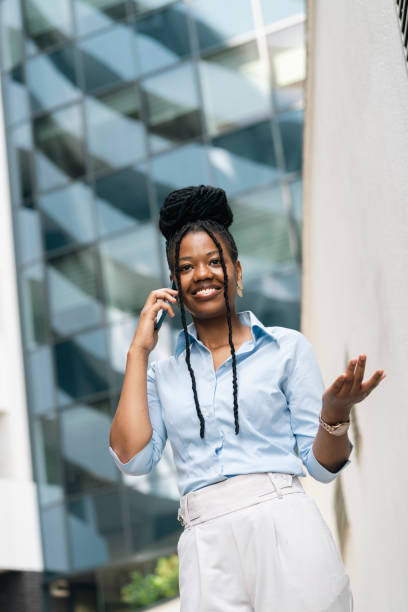 istock Young business woman using phone 2178406778