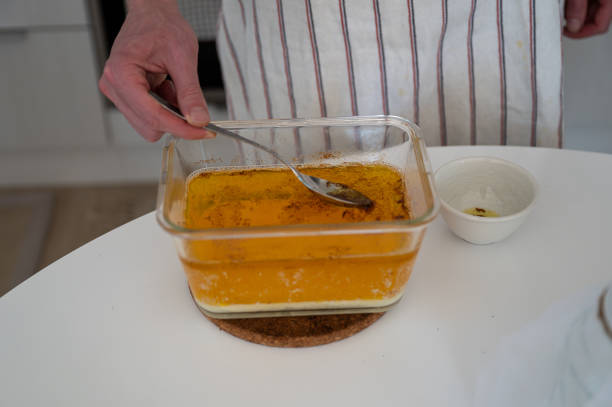 istock process of cooking ghee oil in a home kitchen 2178411476