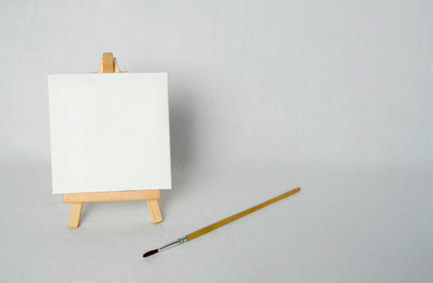 istock Mini easel with white blank canvas. Art concept. White background. 2178411643