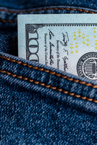 istock US $100 dollar bill in jeans pocket 2178414467