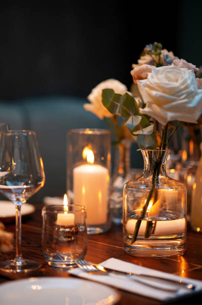 istock Elegant Table Setting with Candles and Flowers 2178417102
