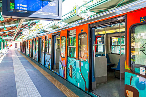Athens, Greece -  August 15, 2023:  Subway car splattered with graffiti on Monastiraki station, Athens, Greece