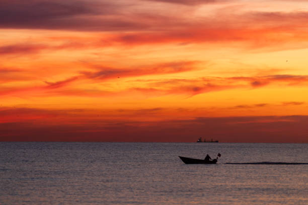 Sun is setting over by horizon.Istanbul - Turkey.