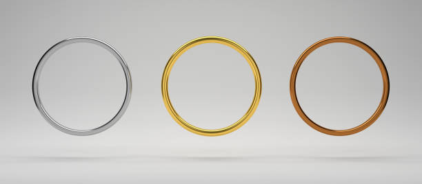 Realistic golden, silver, copper rings set, falling 3d jewelry accessories. Decorative design elements.First, second and third place medals or buttons isolated on gray background.