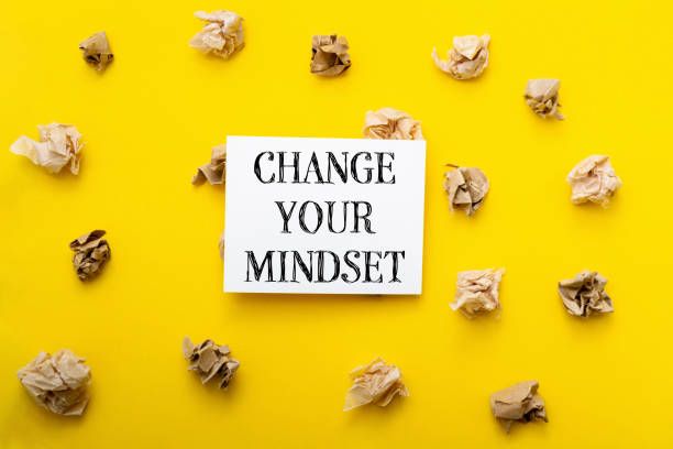 istock Change your mindset. The paper is on a yellow background. 2178426292