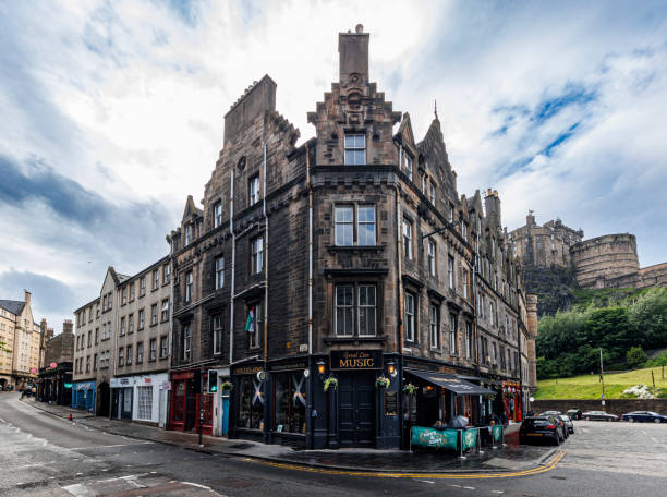 Edinburgh, Scotland - June 16, 2024: The Fiddler's Arms is a traditional Scottish pub at the edge of the Grassmarket in Edinburgh.
