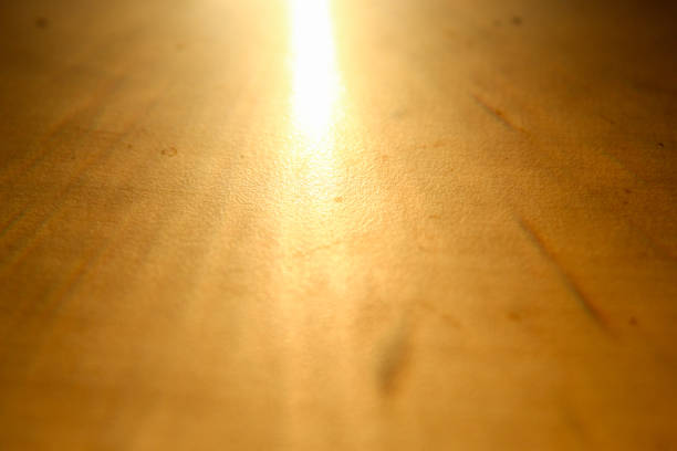 natural light dark gold sunlight on the table. sunlight, light, ray