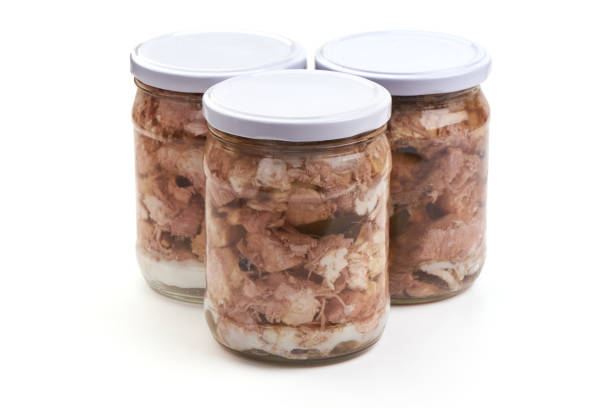 istock Canned meat in a glass jar, isolated on white background. 2178431801